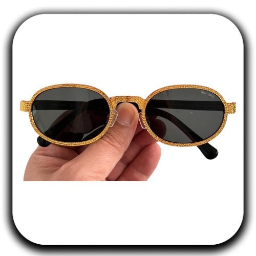Buy Miu Miu Women's Black Gold Sunglasses - Luxury Dubai