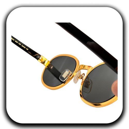 Buy Miu Miu Women's Black Gold Sunglasses - Luxury Dubai