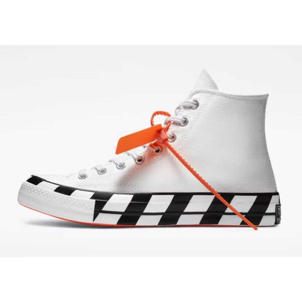 Step into luxury with these Off White x Converse Chuck 70 high top sneakers. The black and white checkered pattern adds a touch of sophistication to your look