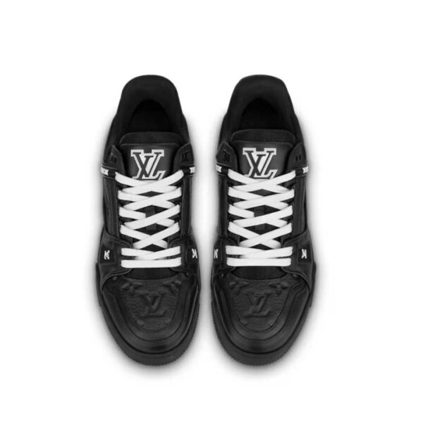 Elevate your style with these sleek black leather sneakers featuring elegant white detailing. Shop now for the luxurious Louis Vuitton Trainer Sneakers in Dubai