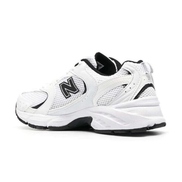 Upgrade your style with the sleek white New Balance 990v3 sneakers