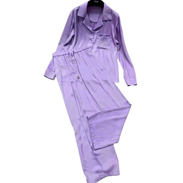 Indulge in the ultimate comfort and sophistication of the Luxury Loewe Anagram Silk Pajama Set - a lavish purple ensemble comprising of a perfectly matched shirt and pants