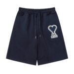 AMI Paris embroidered-logo track shorts In Dubai | AMI Paris Embroidered-Logo Track Shorts | Stretch-Cotton | Ami de Coeur | Summer Shorts | luxury track shorts | Dubai fashion shorts | men's designer shorts | beach club shorts | hot weather shorts | men's shorts