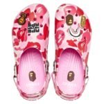 Crocs x BAPE Classic Clog Camo Pink | Crocs x BAPE Classic Clog in ABC Camo Pink – side view with black strap and white accents