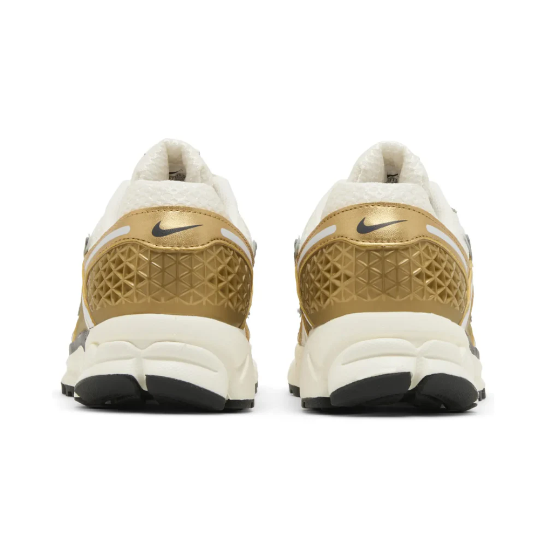 Nike Air Zoom Vomero 5 'Metallic Gold' 3 Rear heel of Nike Air Zoom Vomero 5 'Metallic Gold' with reflective elements